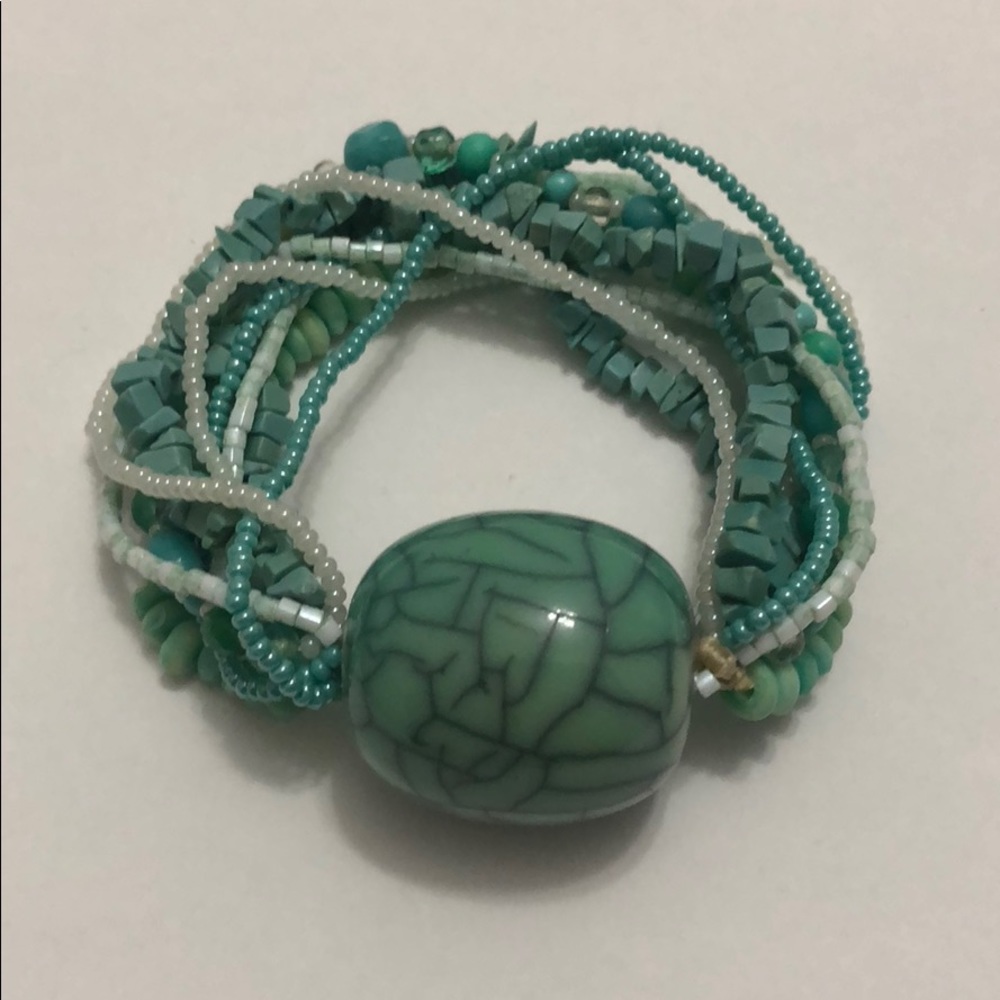 Bracelet with multi strands and green stone
